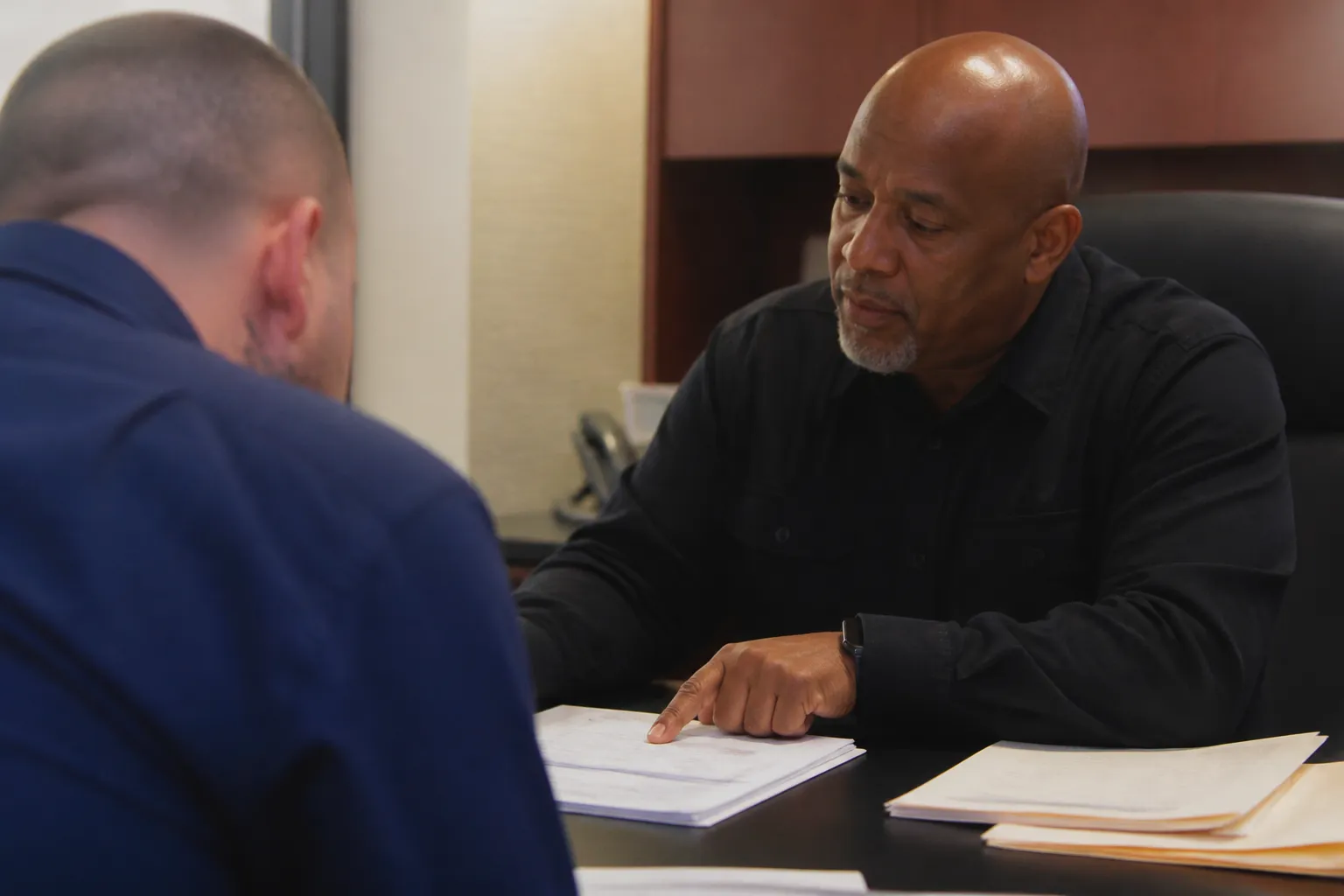 2d Chance counselor reviews intake forms with a new participant during comprehensive evaluation in Las Vegas.