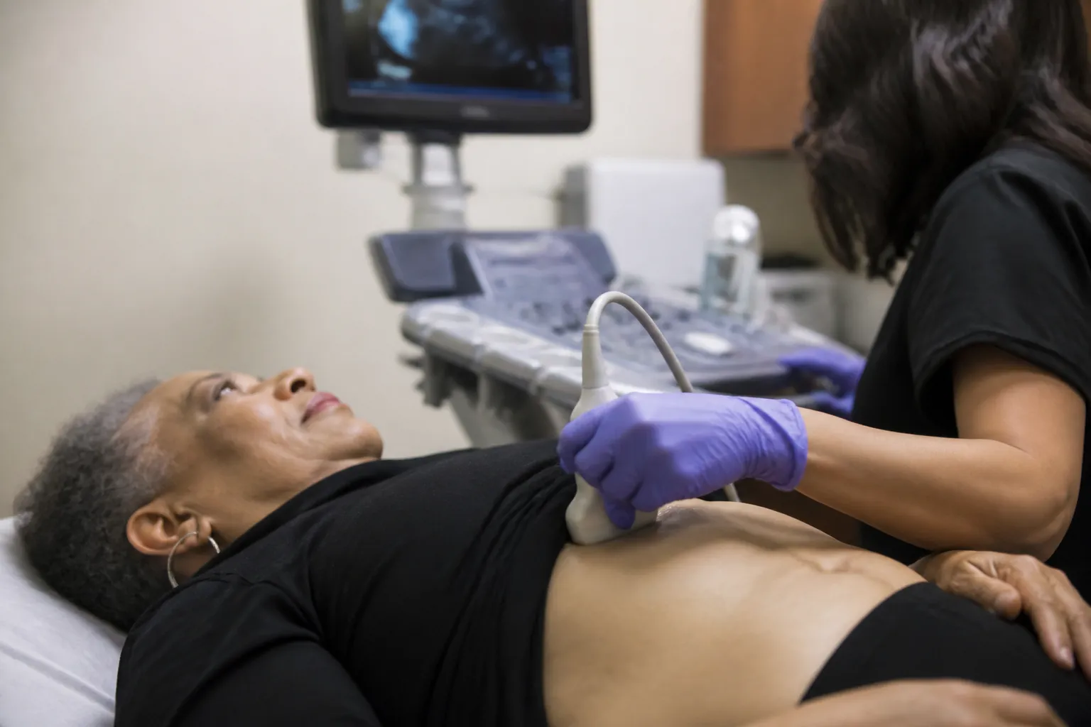 Older adult receiving an ultrasound at a Lions HealthFirst Foundation screening during a weekday afternoon.