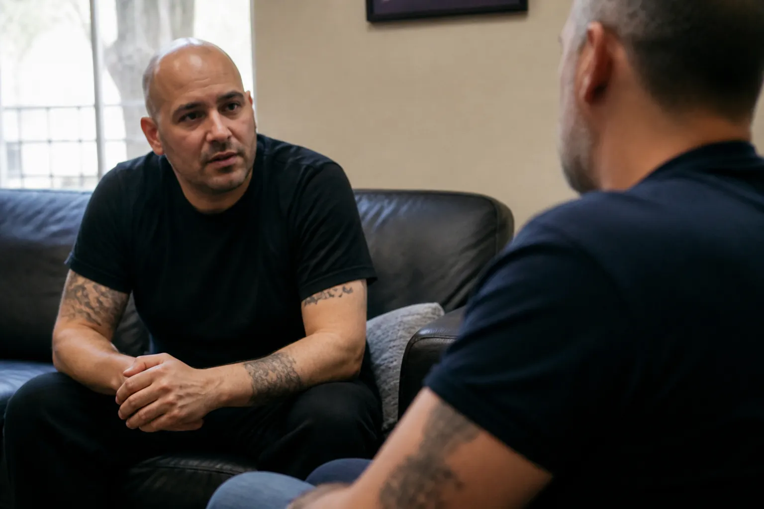 Participant talks with a 2d Chance mentor about sobriety and honesty in recovery in Las Vegas.