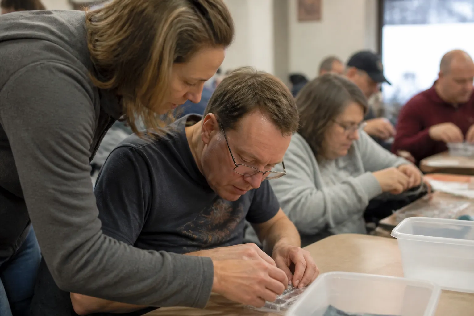 MDSC staff support adults with developmental disabilities in Missoula, MT during a day-support program site visit.