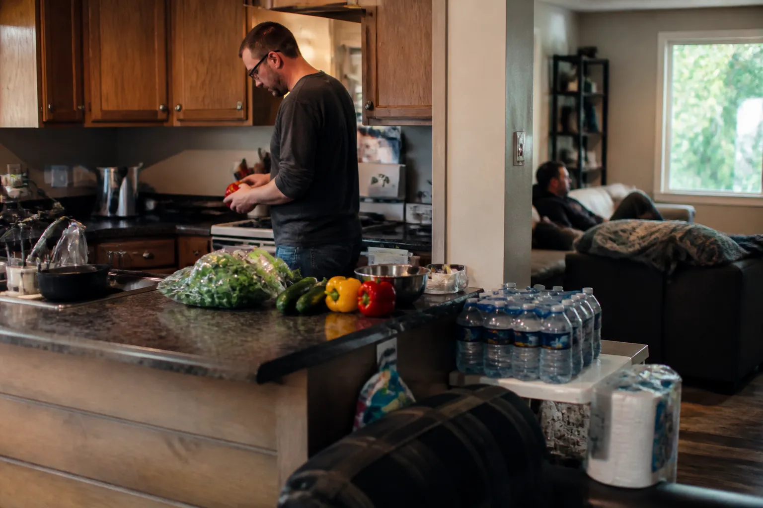 MDSC group home kitchen in Missoula with meal prep and supplies set up during room-and-board support.